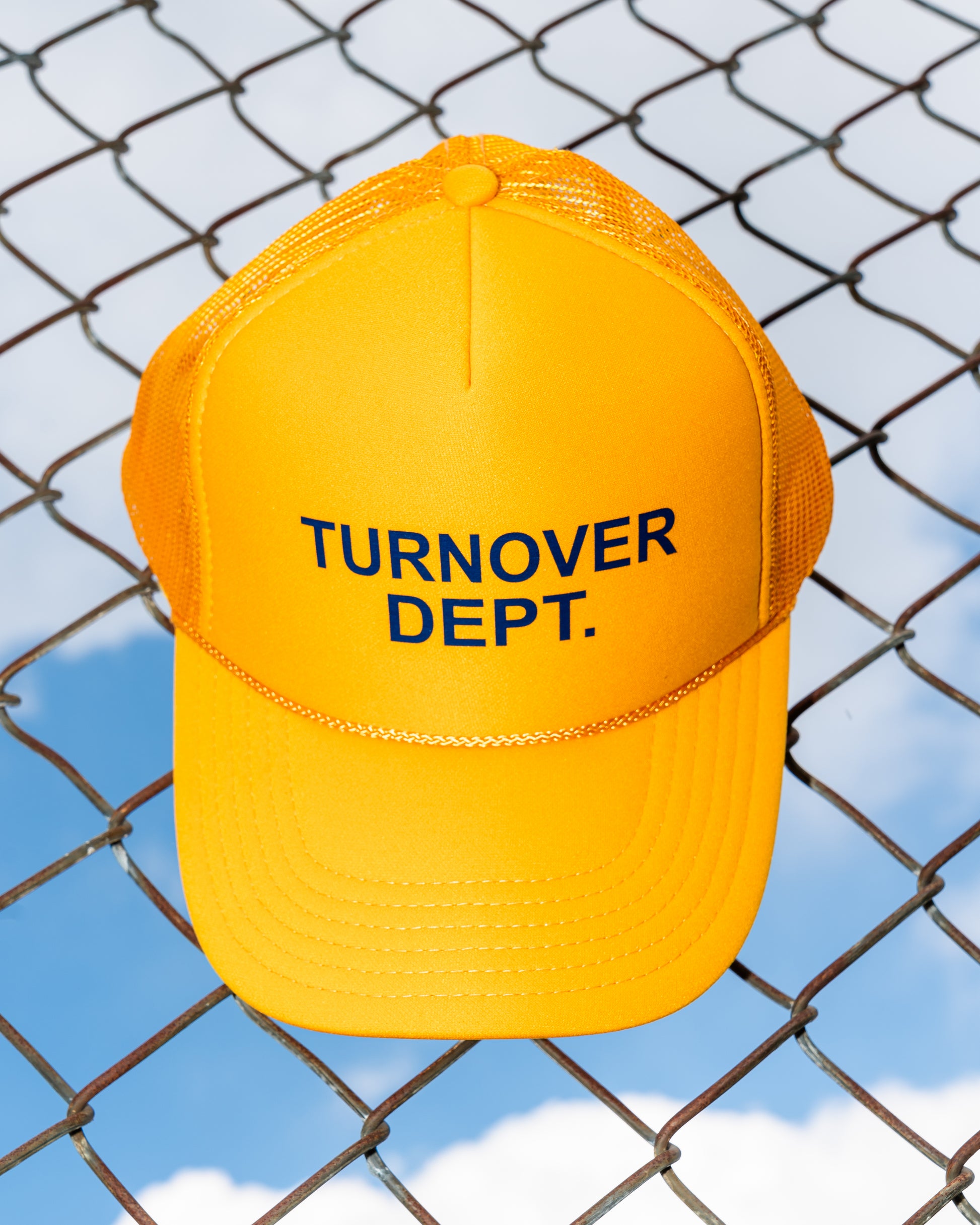 Maize Turnover Dept Trucker Hat